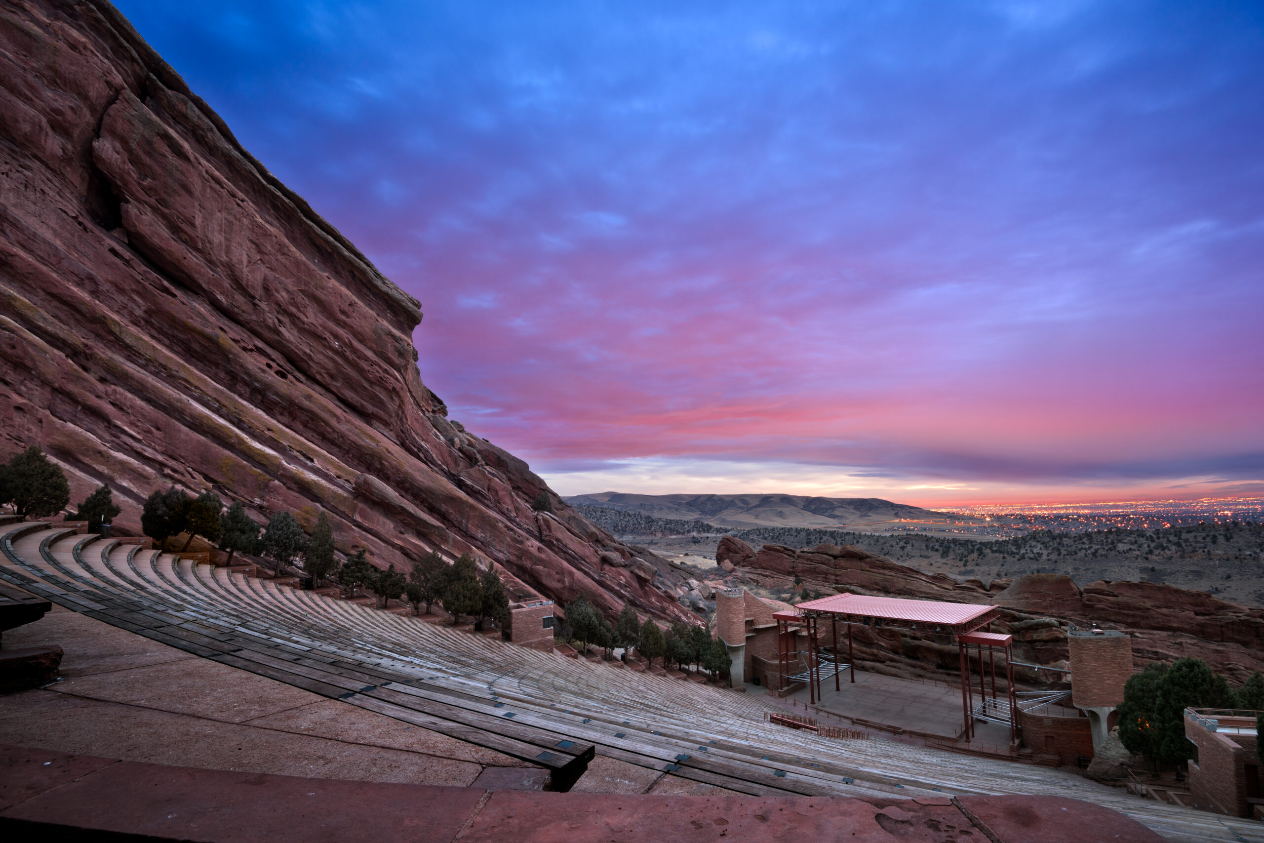 view of red rocks amphitheater in Denver, CO at sunset
